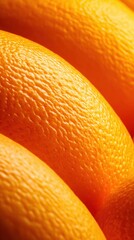 Close-up of vibrant orange fruits showcasing textured skin with soft lighting for culinary use