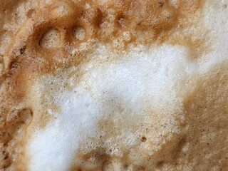 Foam background. Close-up of coffee foam. Coffee