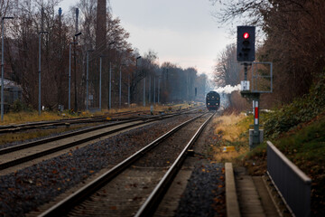 old steam train Dampflok with a lot of steam in saxony bischofswerda 528141-5 Dampflok