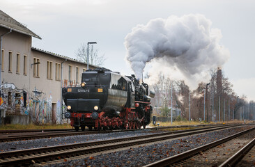 Fototapeta premium old steam train Dampflok with a lot of steam in saxony bischofswerda 528141-5 Dampflok