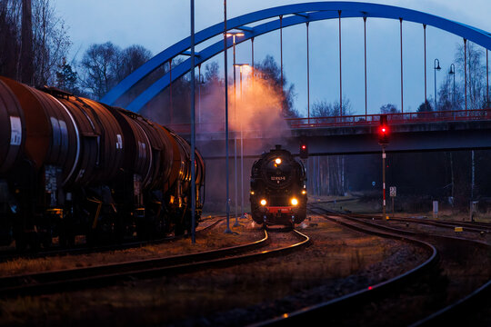 old steam train at night with lights 528141-5 Dampflok in saxony germany