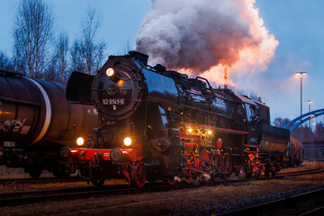old steam train at night with lights 528141-5 Dampflok in saxony germany