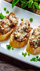 Mushroom bruschetta and grated parmesan