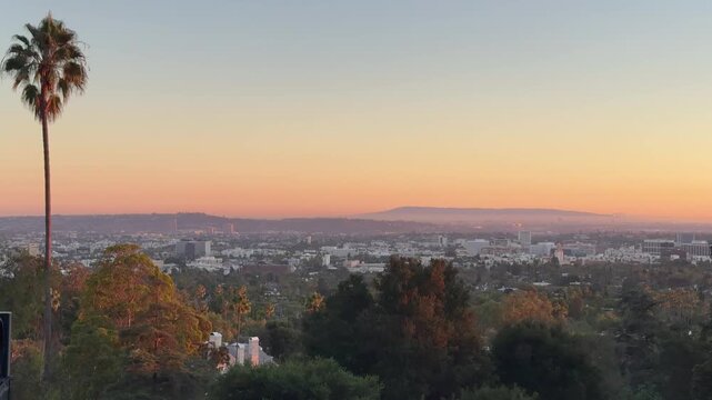 Beautiful panoramic aerial Los Angeles and Beverly Hills vista at sunset, Southern California