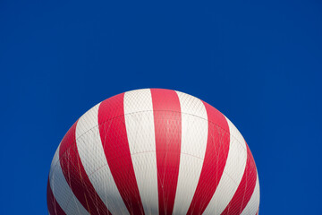 A hot air balloon as a viewing platform for tourists is flying high in the sky in Budapest, Hungary.