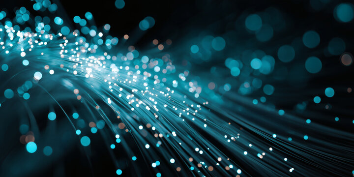 Dynamic abstract black background with flowing turquoise fibre optic strands and bright bokeh dots, ideal for technology, fast data transfer, internet and communication themes