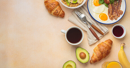 Breakfast warm beige background eggs vegetables salad, oats fruit, croissants, coffee, juice healthy