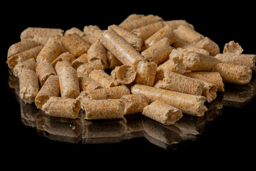 Wood Pellets On Reflective Black Surface, Glossy Pile With Sharp Studio Lighting And Mirror Reflection, Commercial Product Presentation For Packaging, Bulk Fuel Marketing And Quality Control