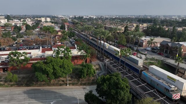 Fullerton, California, USA - Aerial View of Downtown Train Station Showing Commercial Passenger Railroad on a Sunny Day