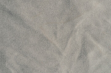 Fabric texture with folds and creases in neutral color
