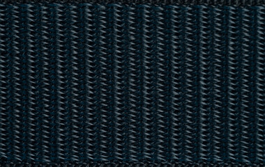 Close view of dark knitted fabric texture in a simple pattern