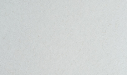 Blank paper on a flat surface in a well-lit room