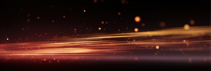 Glowing light streaks on black background - abstract motion and energy