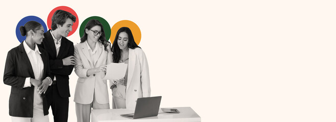 Four young professionals gather around a table in a bright office, discussing ideas while reviewing documents. They appear engaged and focused on their teamwork, showcasing collaboration.