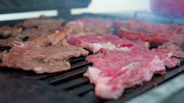 Grilling juicy mexican carne asada steaks