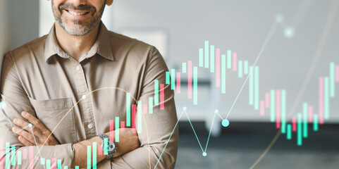 European middle-aged businessman stands confidently in his office, smiling while leaning against a wall. He exudes professionalism and self-assurance amidst a backdrop of financial data.