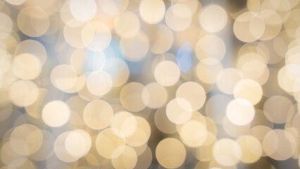 White and gold soft bokeh light blur abstract background