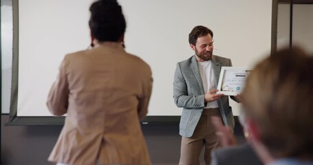 Conference, handshake and success with business people on stage for award ceremony, thank you and winner. Shaking hands, certificate and seminar with employees at event for support and promotion