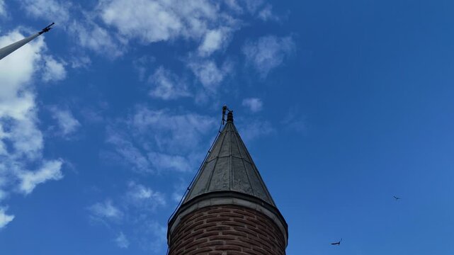 The minaret of the historic R&uuml;stem Pasha Mosque in Turkey, near Istanbul, rises gracefully as a symbol of classical Ottoman architecture. Built in the 16th century, it features elegant stonework, bala