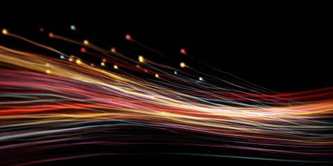 Dynamic light trails in motion against black background