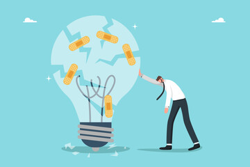 Failed of innovation, analysis and setting goals for correcting of unprofitable or ineffective business ideas, recovery from emotional burnout, tired businessman beside a patched lightbulb.