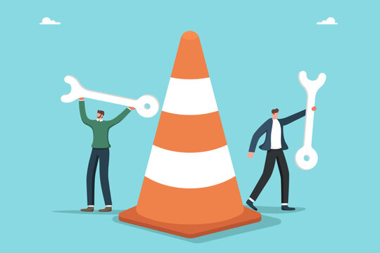 Technical support and optimization of work processes, assistance in correcting unforeseen circumstances, teamwork to solve complex situations and problems, men with wrenches near a traffic cone.