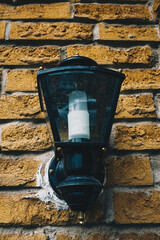 Old Street Lamp On The Wall Of A House