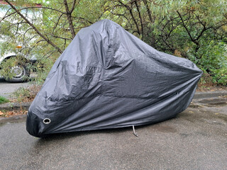 Black nylon cover on motorbike © Harmony Video Pro