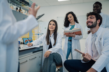 Diverse students attending a lecture in laboratory