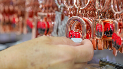 Collection of New York keychain souvenirs showcasing iconic symbols and city landmarks