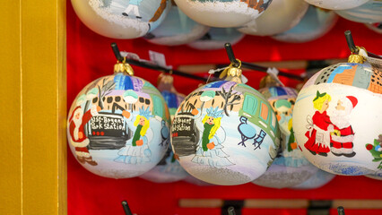 Fototapeta premium Traditional Christmas balls decorations displayed with vibrant colors and sparkling lights