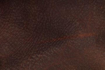 Fototapeta premium Dark brown old worn leather texture