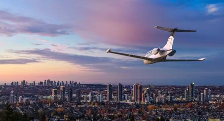 Private Jet Over City Skyline at Sunset: Airplane Flight Over Burnaby, BC, Canada