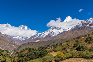 Ama Dablam mountain summit, famous mountain view in Himalaya mountains, Nepal. Everest Base Camp trek beautiful landscape view of snow high altitude summit and glacier. AmaDablam classic view