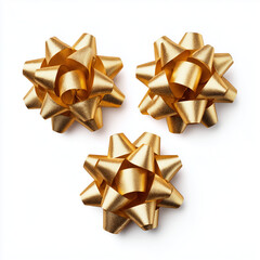 shiny gold gift bows and ribbons on white background
