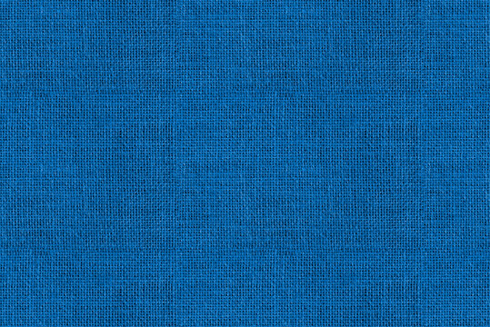Blue fabric background &ndash; seamless texture of textile material. Woven linen cloth swatch.