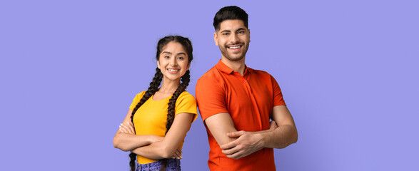 Two friends stand back to back, smiling brightly. The girl with braids wears a yellow shirt and...