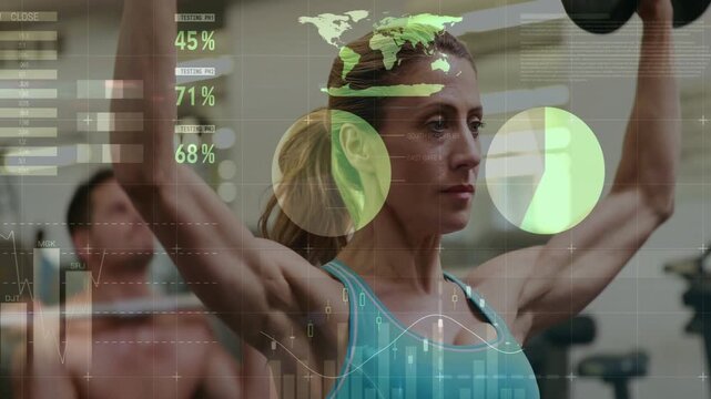 Female lifter pressing dumbbells in fitness gym, HUD charts appearing over torso and tracking stats