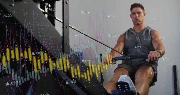 Man gripping handle starting drive, driving legs, pulling while charts showing fitness over subject