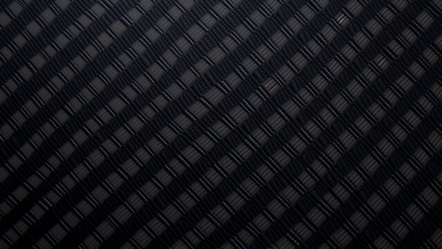 Black carbon fiber texture with diagonal weave pattern