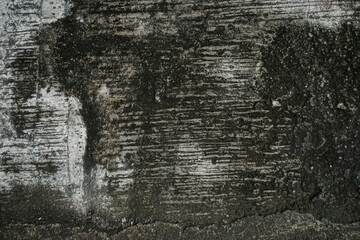 Obraz premium Abstract dark and white grunge texture background of damaged weathered cement surface