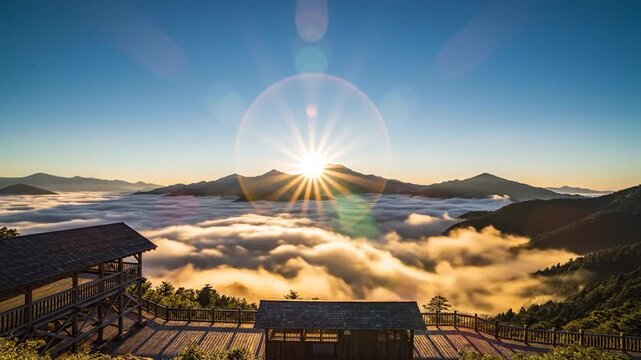 Majestic sunrise above a vast cloud sea, observed from a serene mountain platform