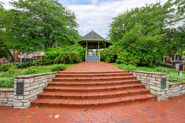 Brick paved steps lead to the Kister Park Gazebo, located on Main Street in the downtown historic...
