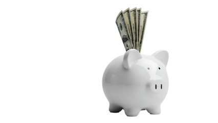 White ceramic piggy bank filled with american currency against a black background