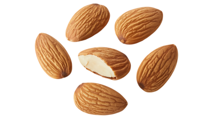 A collection of whole almonds and one almond cut in half, showcasing the white kernel inside, isolated on a pure transparent background for a clean presentation of this healthy nut