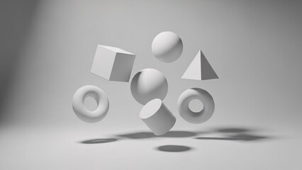 Abstract 3D geometric shapes floating in a minimalist white studio environment.