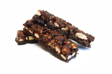 Stack chocolate chip with peanuts protein bars isolated on a white background.