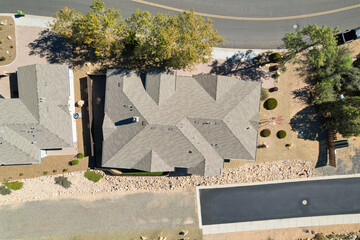 Highaltitude Drone Photography Illustrating Structural Configuration And Shingle Placement Of Roof