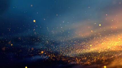 Naklejka premium A vibrant abstract image featuring shimmering particles against a gradient backdrop of blue and orange hues.