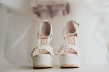 bridal heels on an armchair